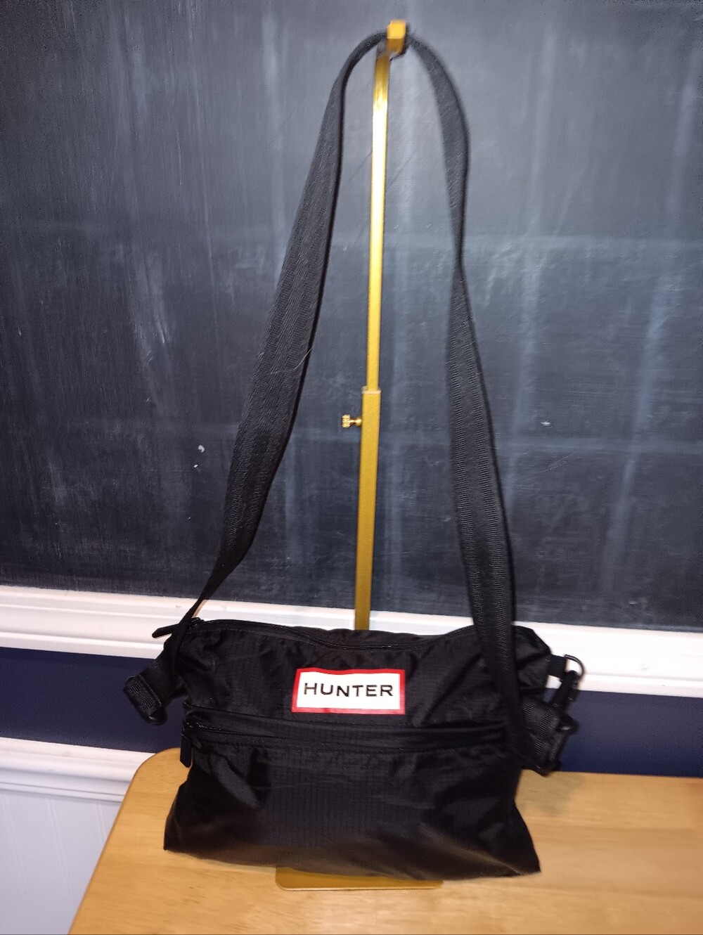 Hunter Black Crossbody Bag with Red-Trim Logo
